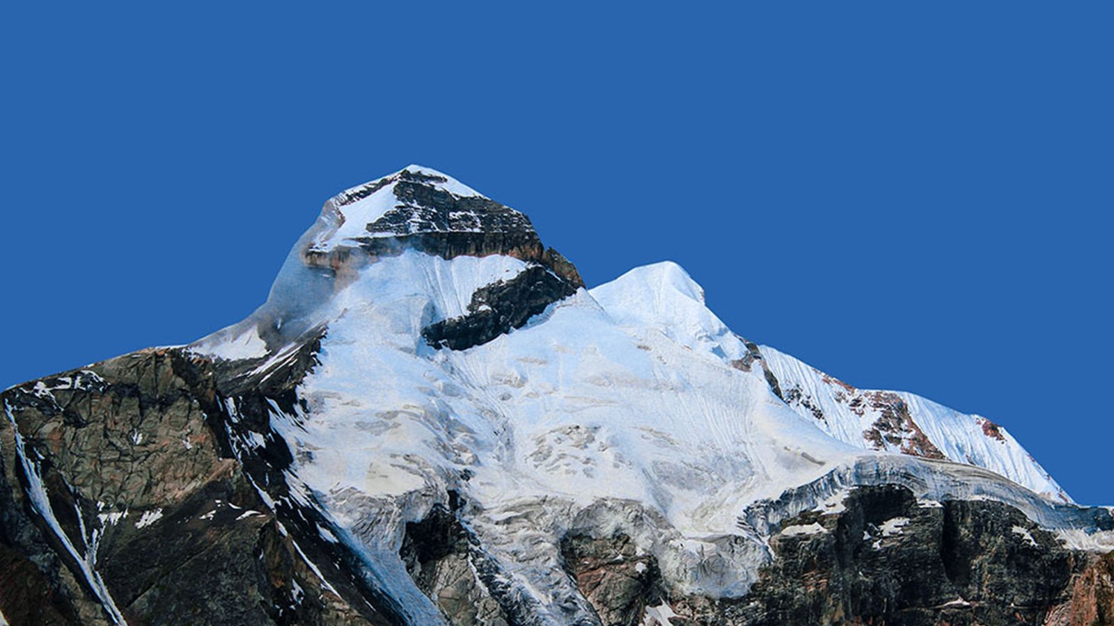 The Snow Covered image of Adi Kailash parvat. Captured in the route of Adi kailash yatra 2026. adi kailash yatra, tour & travels, Spiritual tour agency, tour & trekking agency, yatra